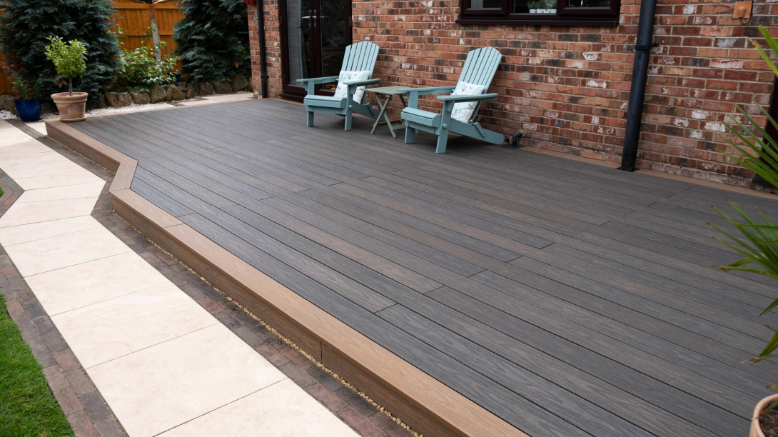 Modern decking area with blue deck chairs.