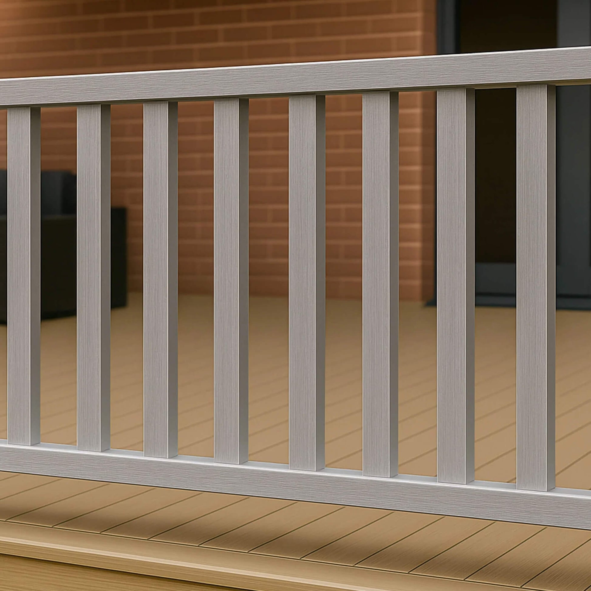 Silver Composite handrail, baserail and spindles on a patio deck.
